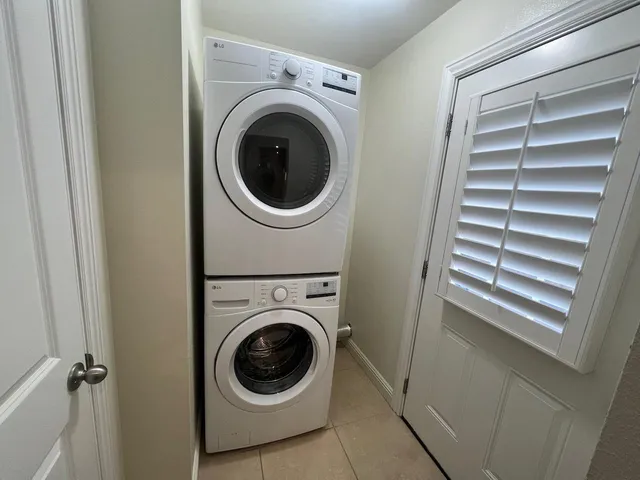 a utility room with washer and dryer