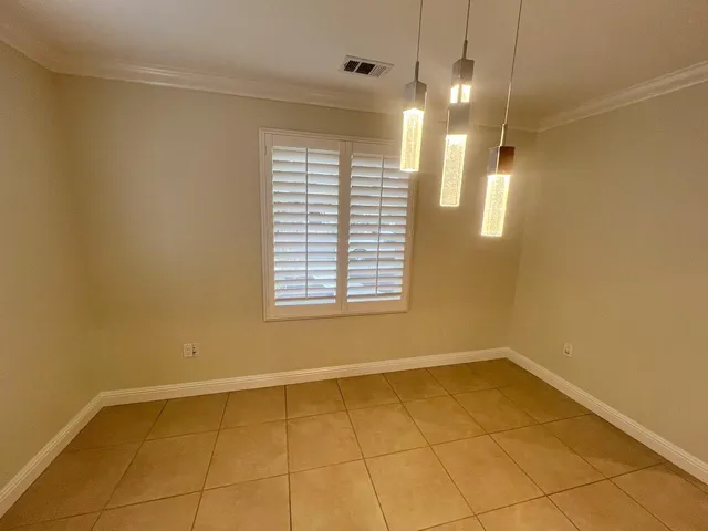 a view of a room with a window