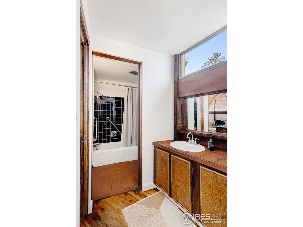 550 College Avenue Boulder, CO 80302 - Photo 19 of 36 a kitchen view with a sink stove and cabinets