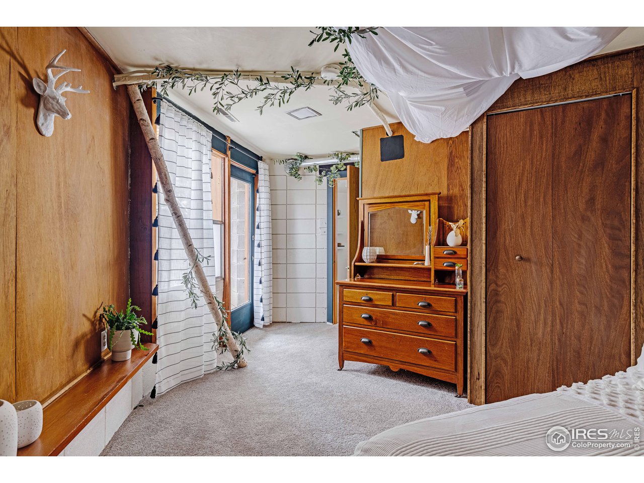 550 College Avenue Boulder, CO 80302 - Photo 24 of 36 a view of a room with furniture and a window