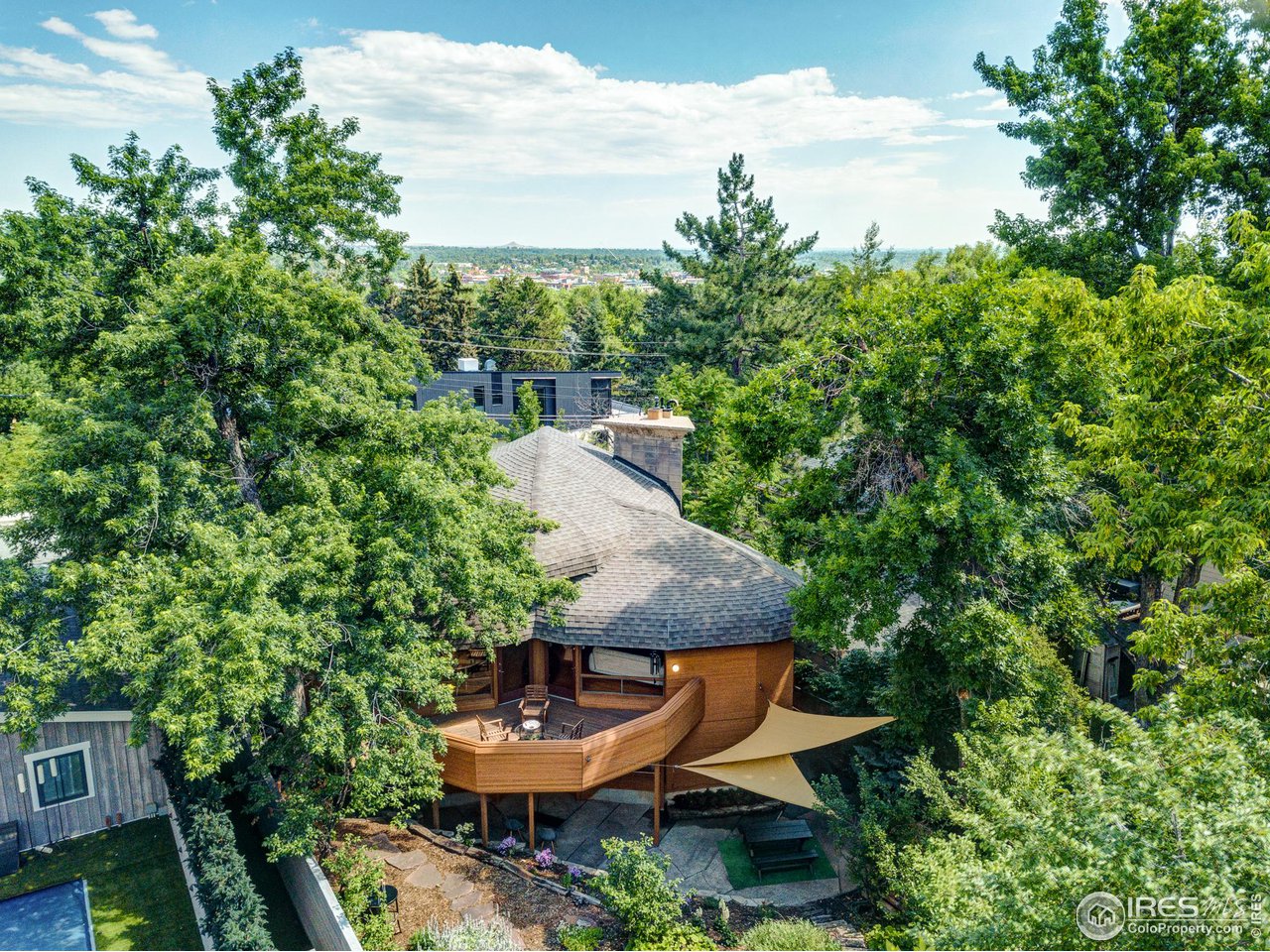 550 College Avenue Boulder, CO 80302 - Photo 33 of 36 an aerial view of a house with swimming pool and trees