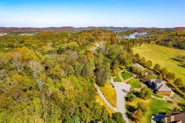 a view of a city with an aerial view of residential houses with outdoor space