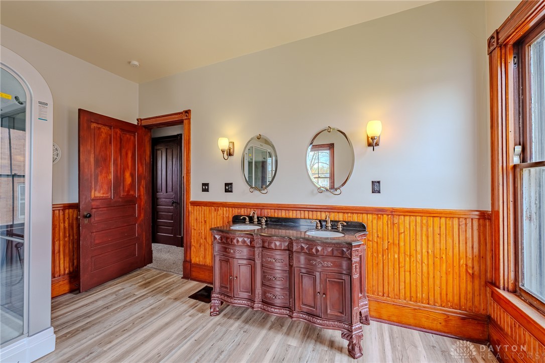308 Yankee Road Middletown, OH 45044 - Photo 25 of 47 This primary bathroom features a double vanity and sleek flooring, providing a comfortable and practical space.