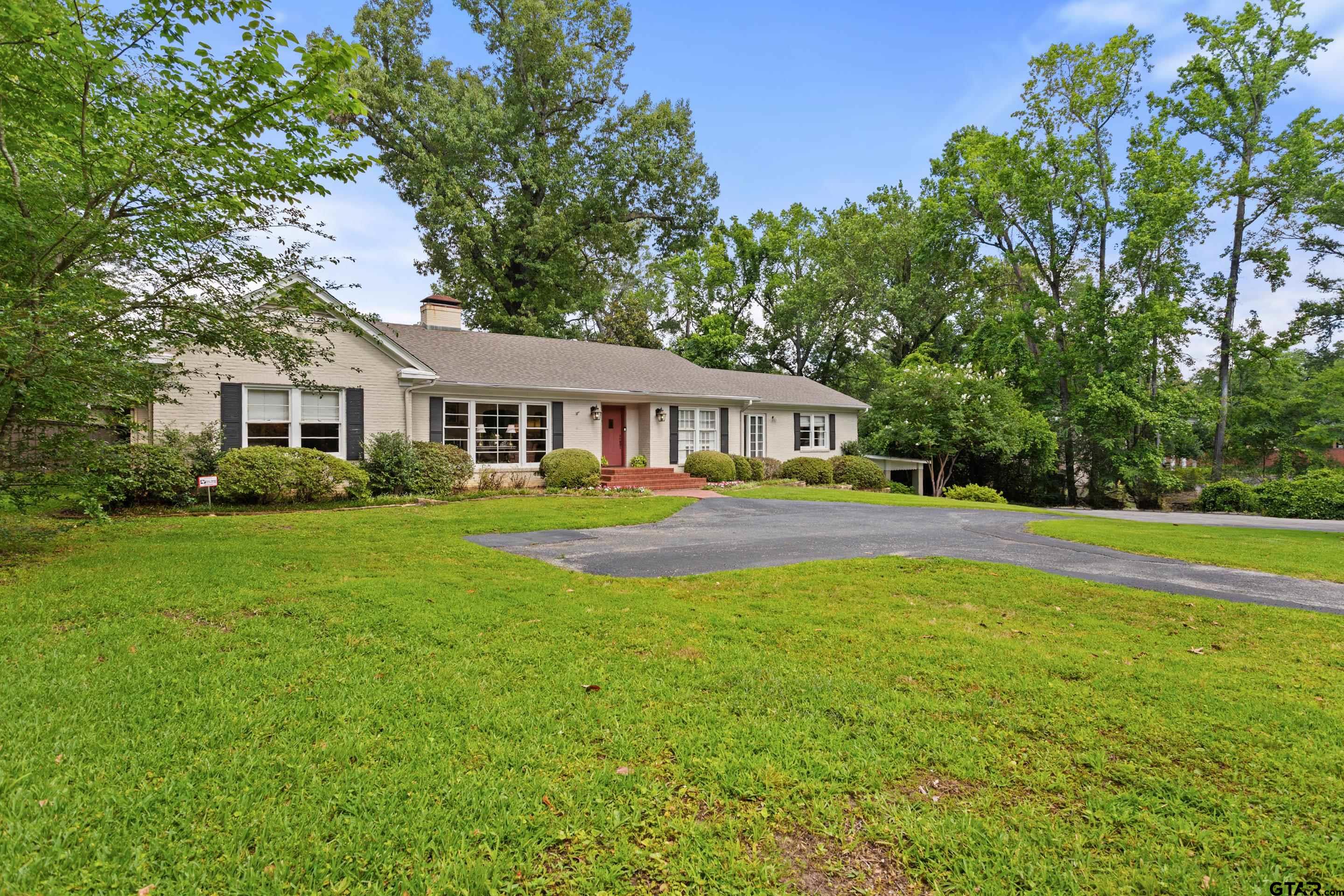 2631 Old Bullard Road Tyler, TX 75701 - Photo 2 of 43 a view of house with yard and outdoor seating