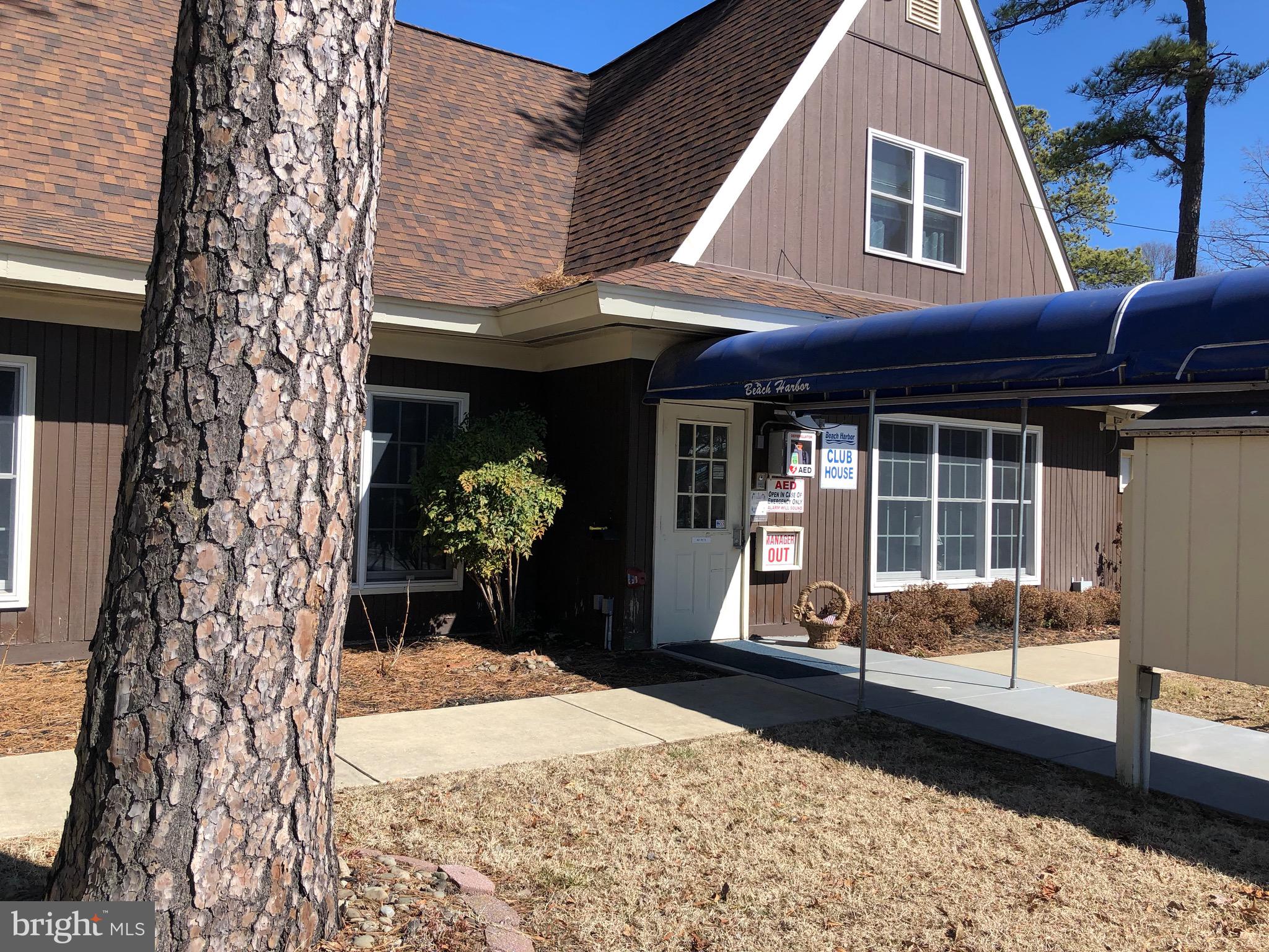 111 Saddler Road, Unit 46F Grasonville, MD 21638 - Photo 19 of 22 a house view with a outdoor space