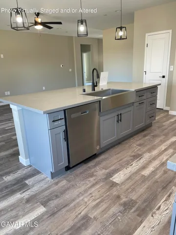 a bathroom with a sink double vanity and a mirror