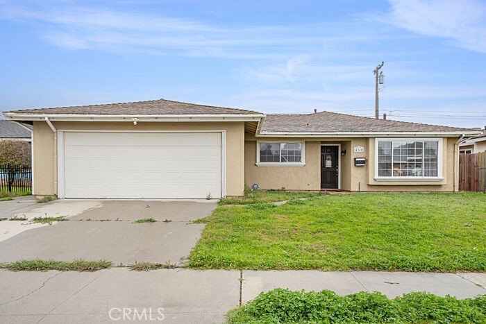 4340 Highland Avenue Oxnard, CA 93033 - Photo 1 of 19 a front view of a house with a yard