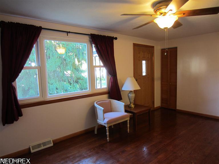 5407 Pleasant Avenue North Ridgeville, OH 44039 - Photo 10 of 17 Beautifully finished hardwood floors in this 17 x 12 Living Room.