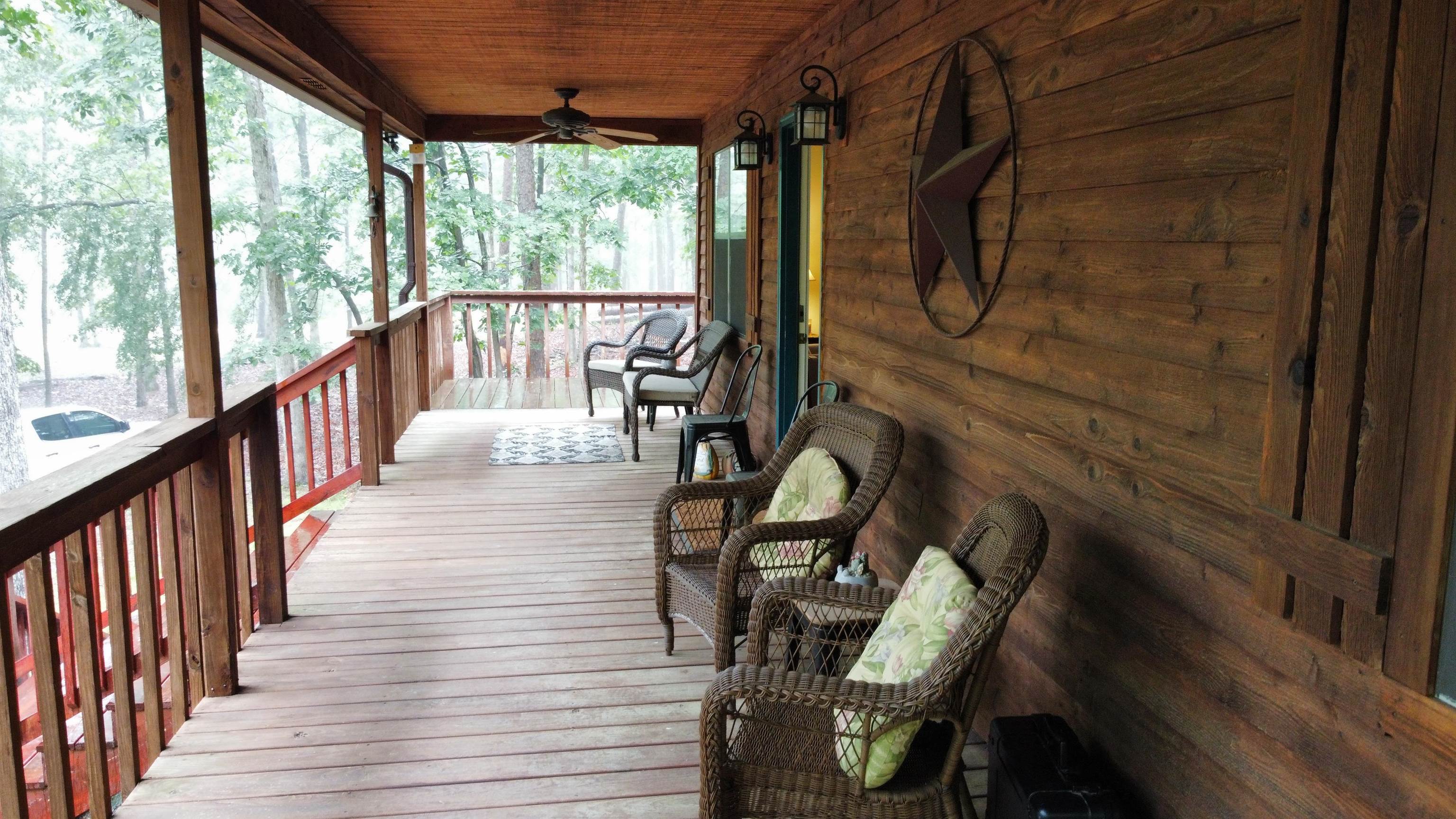 275 Bryson Harbor Road Counce, TN 38326 - Photo 12 of 23 Spacious wood-plank deck featuring a wood railing, a wood-slat ceiling, and a ceiling fan