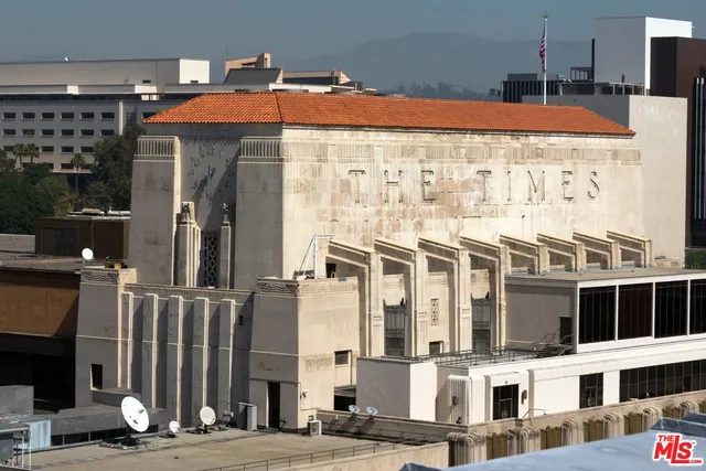 a front view of a building with street view
