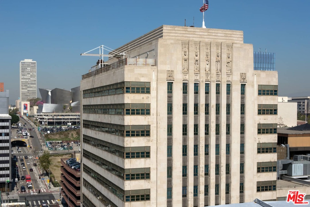 108 West 2nd Street, Unit 606 Los Angeles, CA 90012 - Photo 26 of 29 a view of a city from a balcony