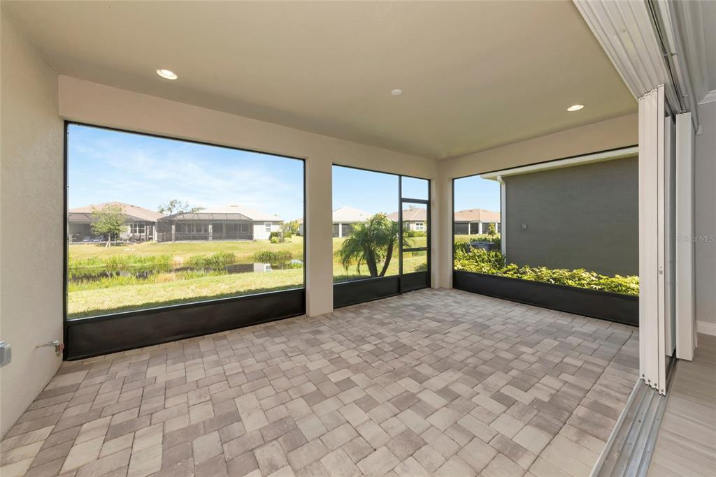 5798 Long Shore Loop Sarasota, FL 34238 - Photo 25 of 40 a view of large windows in an empty room