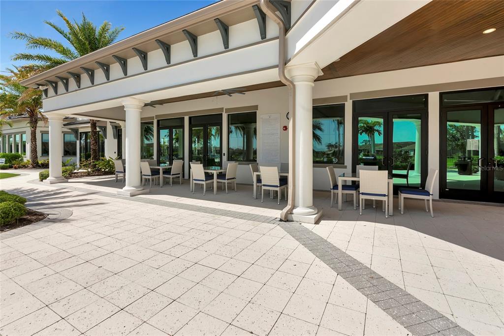 5798 Long Shore Loop Sarasota, FL 34238 - Photo 34 of 40 a building exterior with furniture