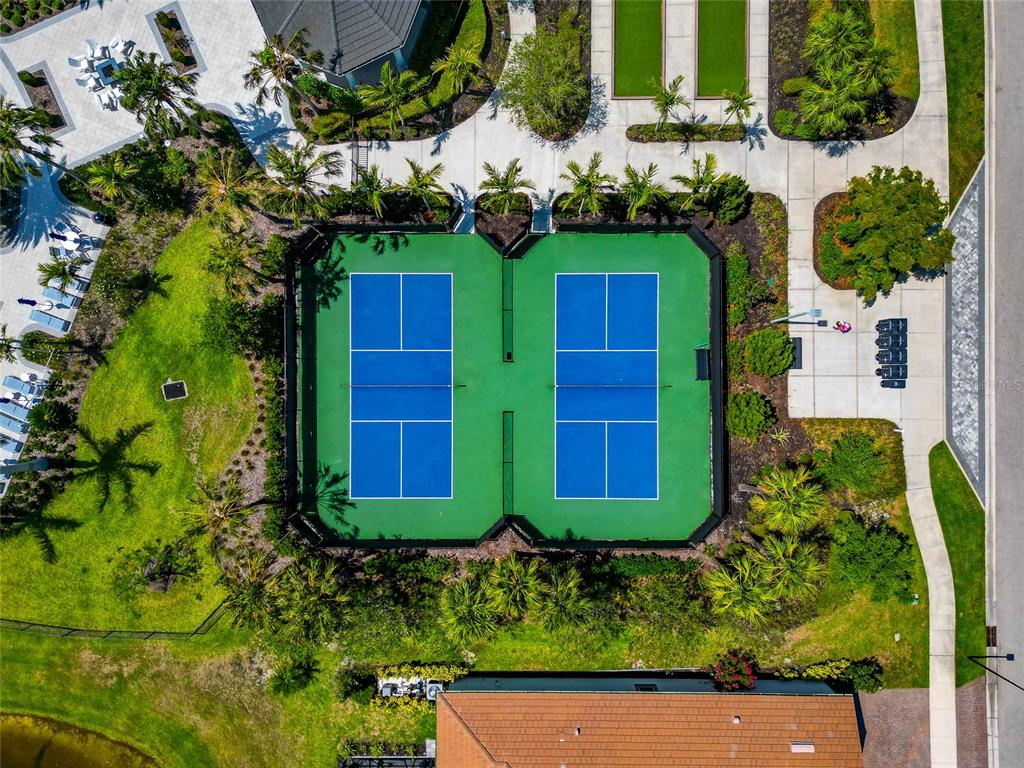 5798 Long Shore Loop Sarasota, FL 34238 - Photo 39 of 40 front view of a house with a yard