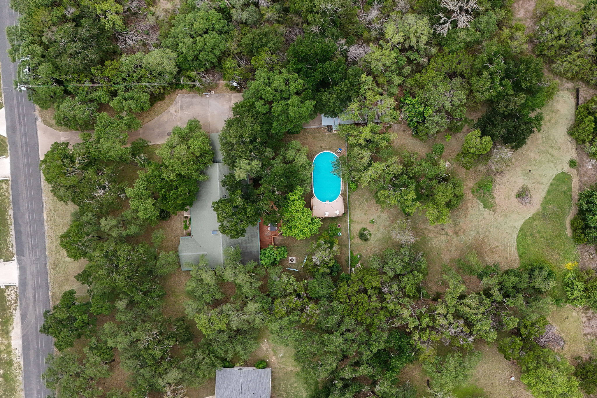 136 Valley View Road Georgetown, TX 78633 - Photo 7 of 40 Drone photo showing the property with Valley View Rd on the left