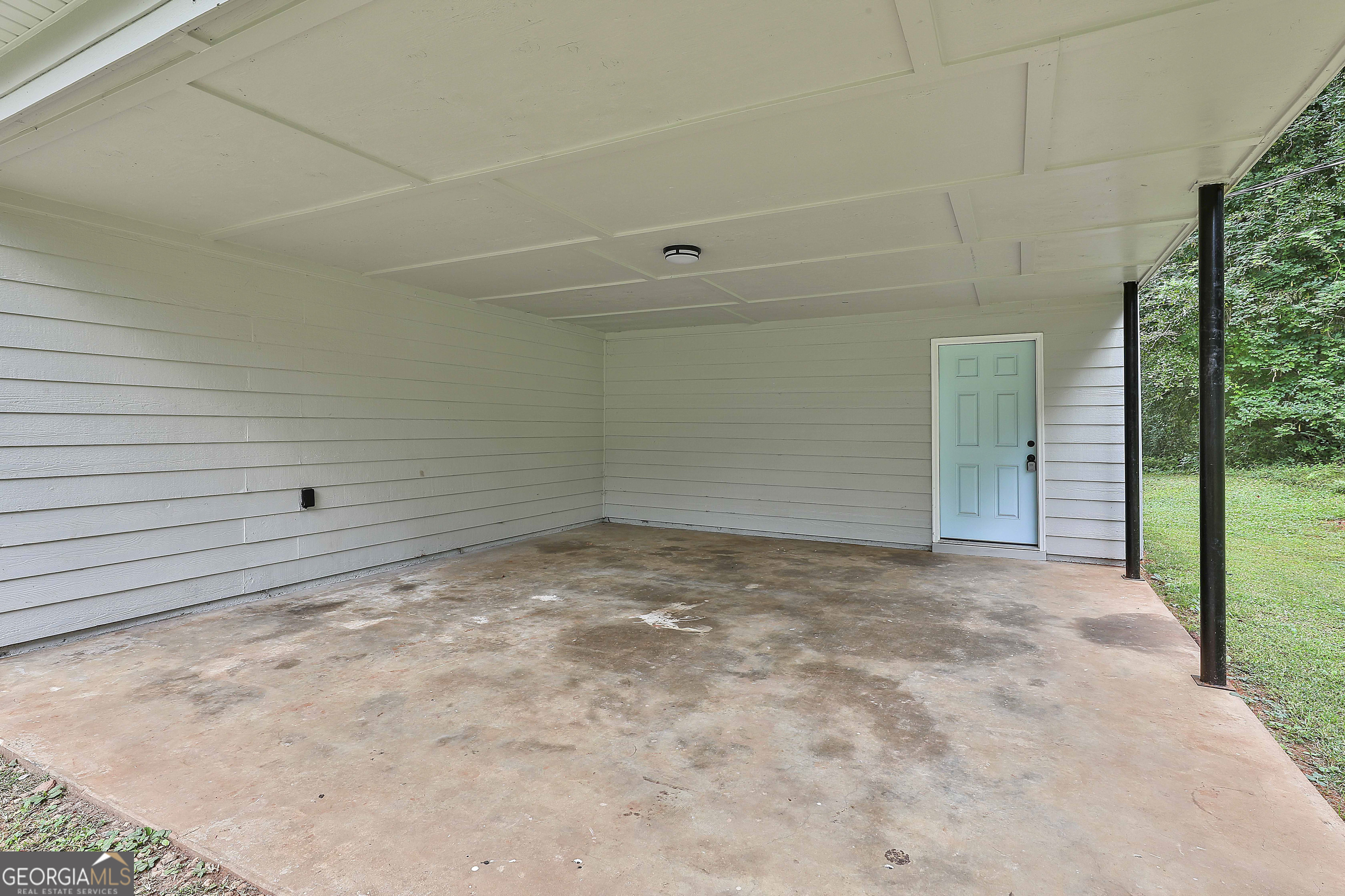 1606 Mcwilliams Barber Road Luthersville, GA 30251 - Photo 3 of 38 a view of a room with a large window