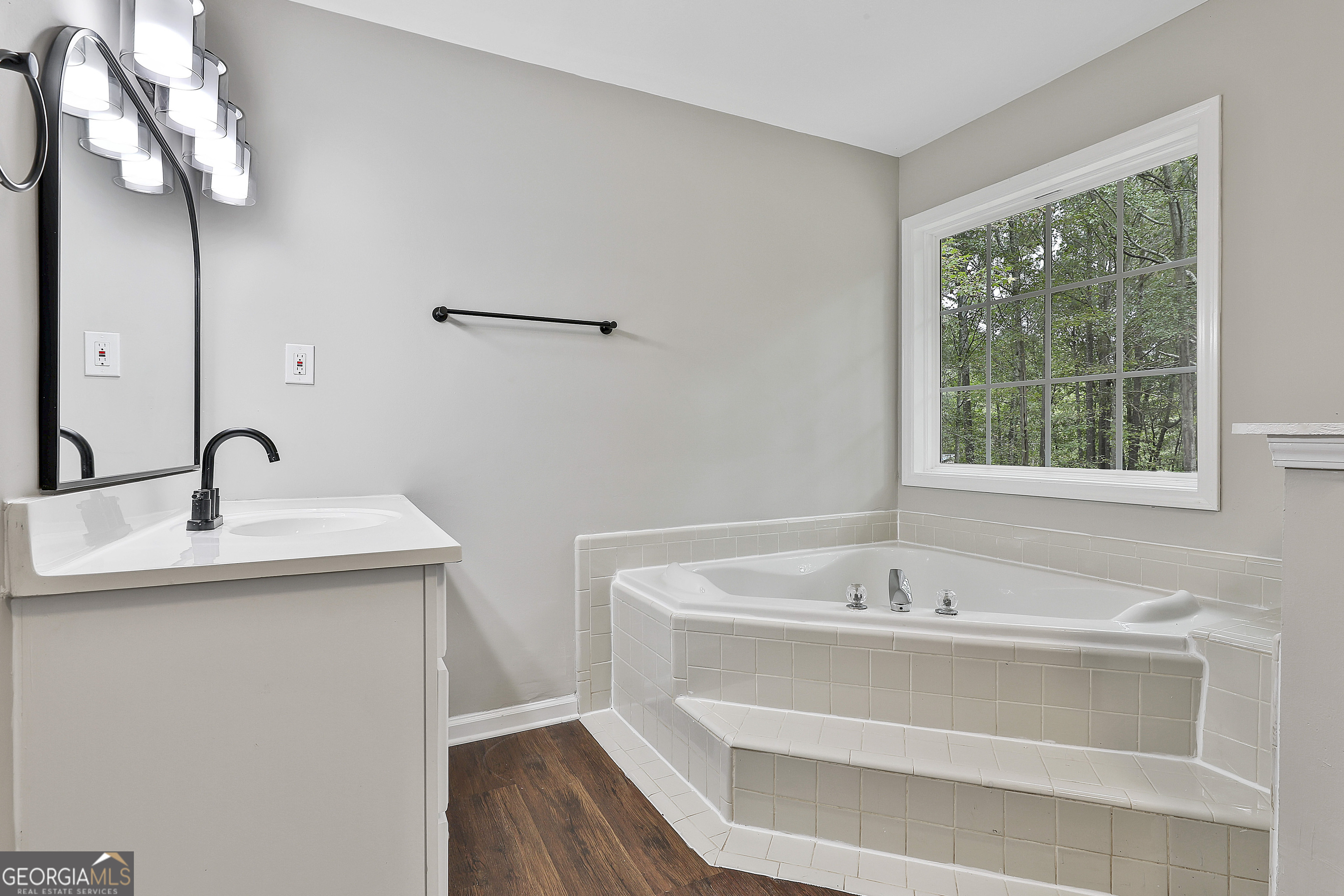 1606 Mcwilliams Barber Road Luthersville, GA 30251 - Photo 33 of 38 a bathroom with a sink and a window