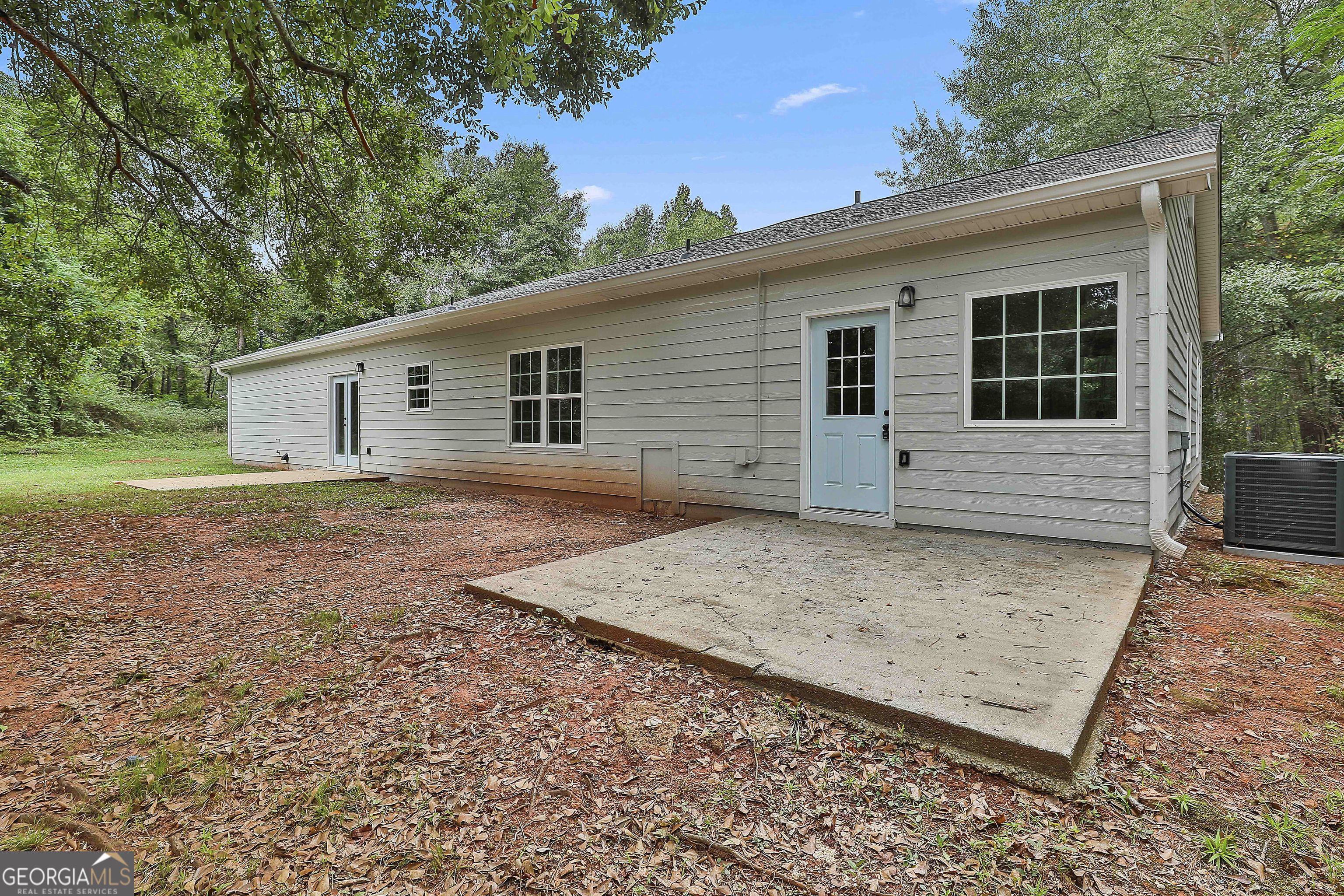 1606 Mcwilliams Barber Road Luthersville, GA 30251 - Photo 36 of 38 front view of a house with a yard