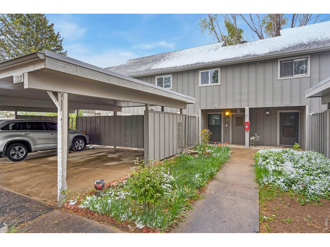 809 East Drake Road, Unit C107 Fort Collins, CO 80525 - Photo 1 of 24 a view of a back yard of the house