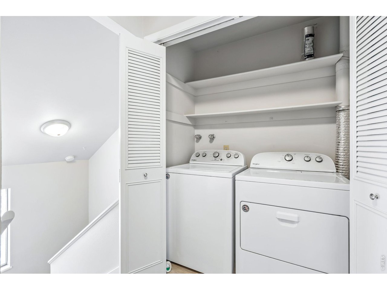 809 East Drake Road, Unit C107 Fort Collins, CO 80525 - Photo 18 of 24 a utility room with dryer and washer
