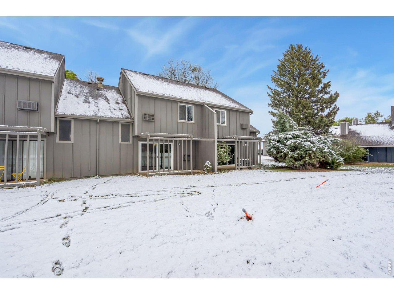 809 East Drake Road, Unit C107 Fort Collins, CO 80525 - Photo 21 of 24 a view of a house with a snow in the yard
