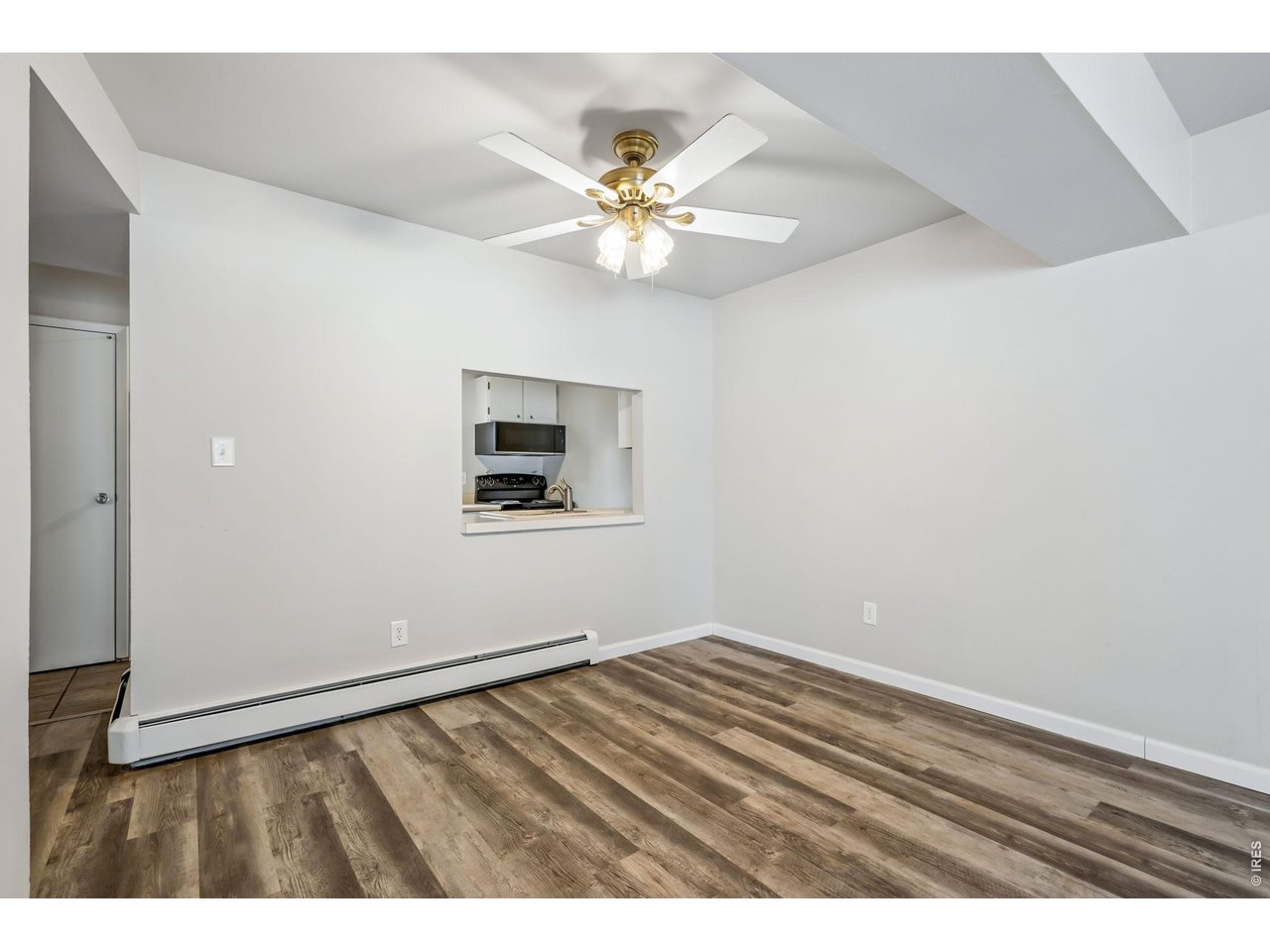 809 East Drake Road, Unit C107 Fort Collins, CO 80525 - Photo 10 of 24 a view of an empty room with a window