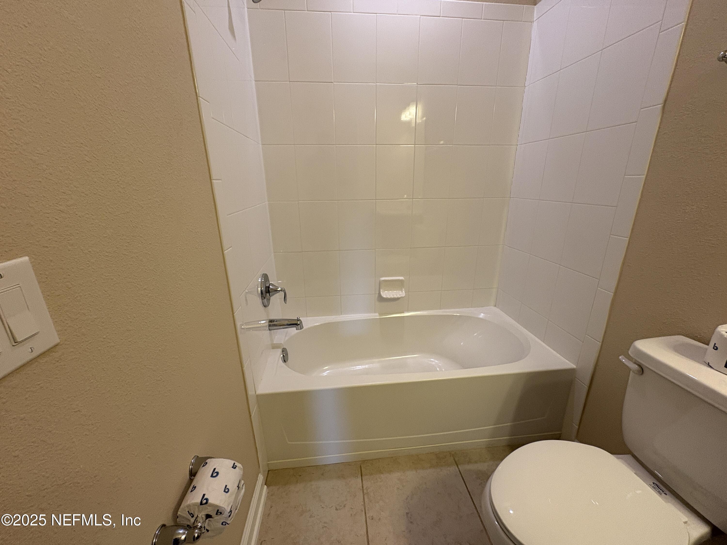 173 Athens Drive St. Augustine, FL 32092 - Photo 22 of 25 a bathroom with a sink and toilet
