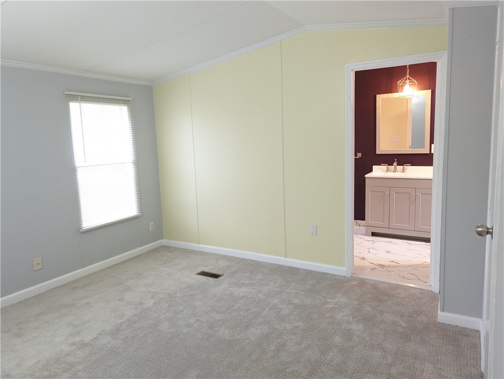 101 MacIntosh Road Ontario, NY 14519 - Photo 14 of 40 Primary bedroom with en-suite bath