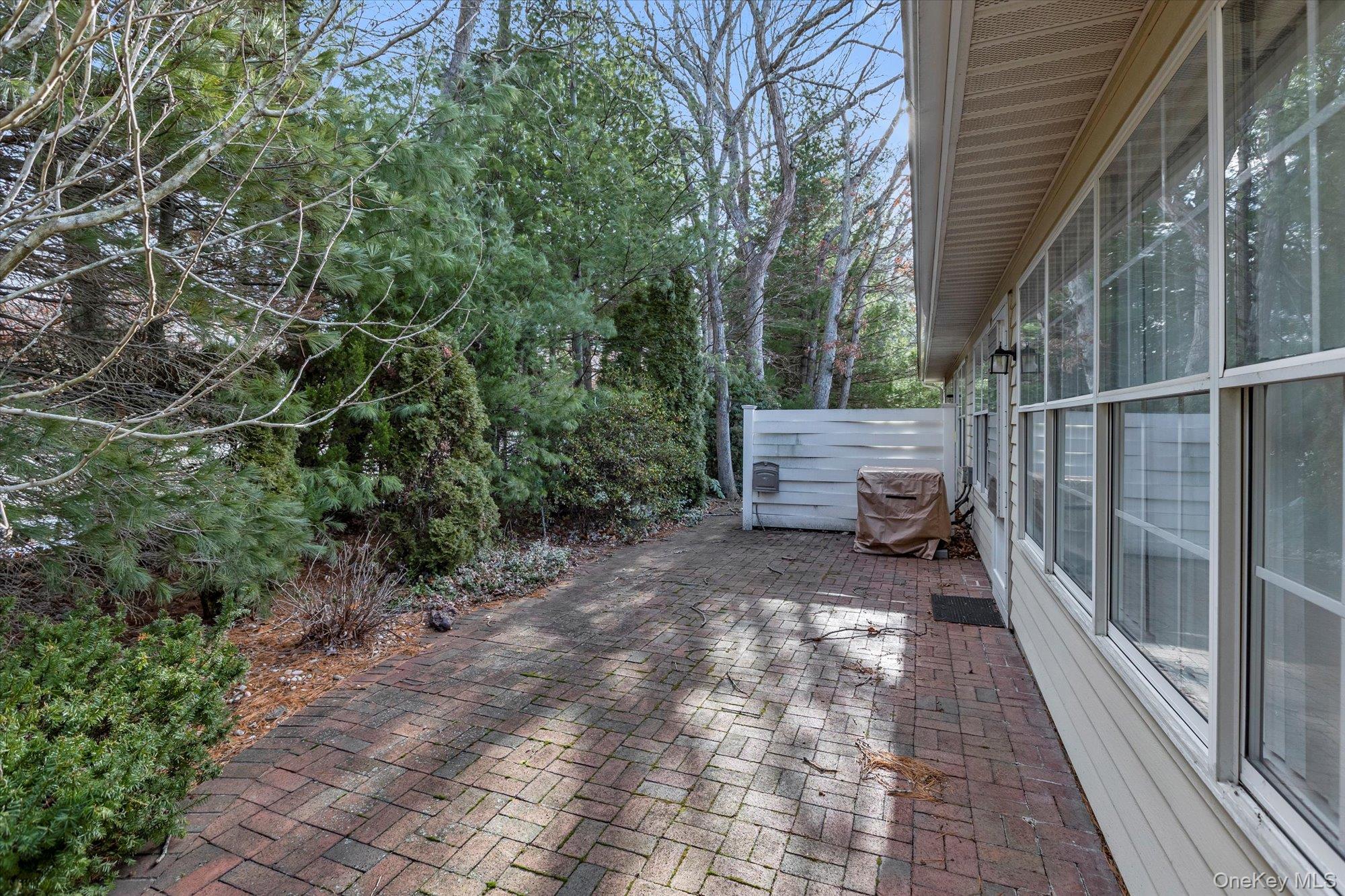 289 Glen Drive Ridge, NY 11961 - Photo 17 of 19 a view of outdoor space and deck