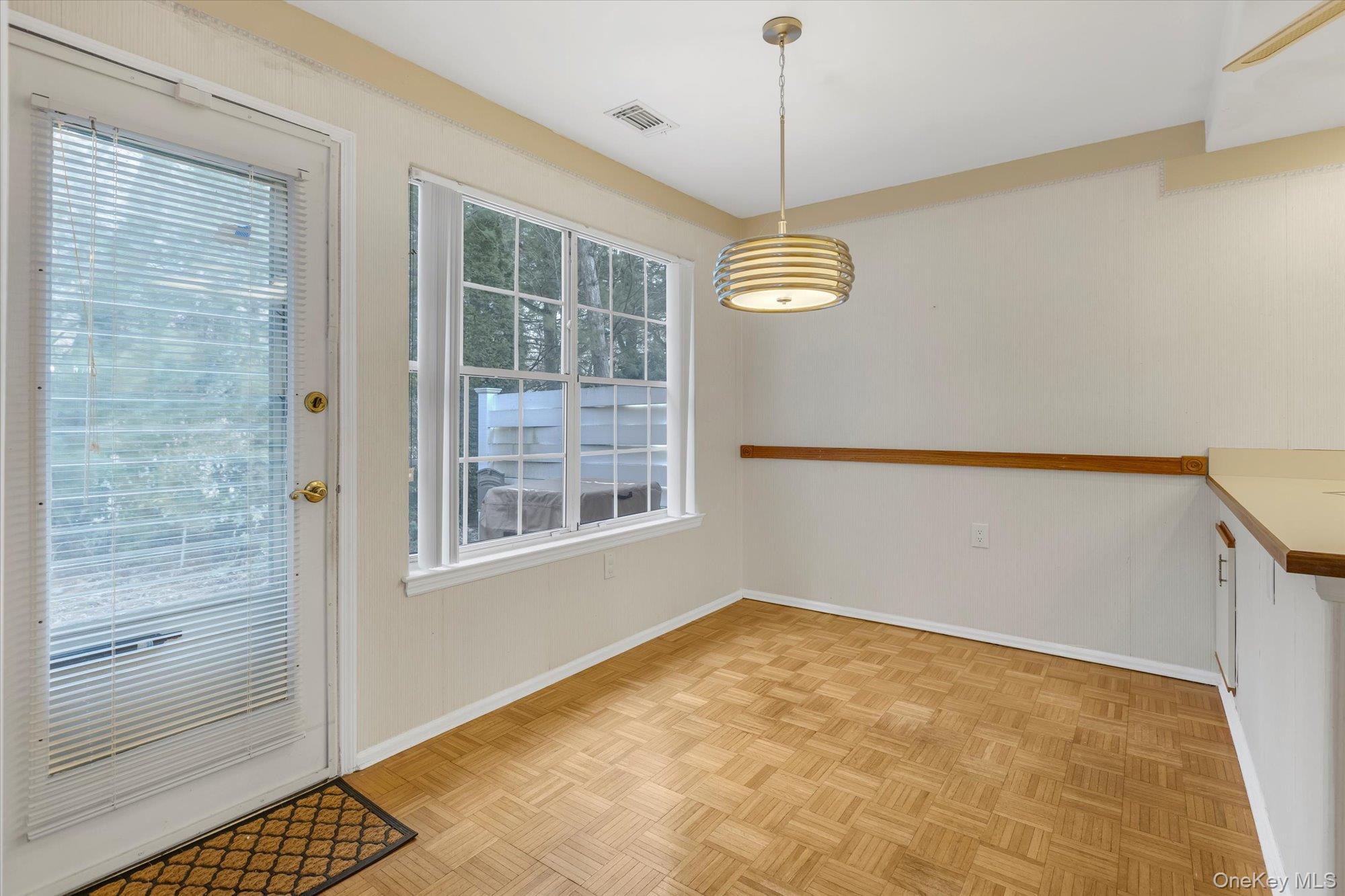 289 Glen Drive Ridge, NY 11961 - Photo 5 of 19 a view of an empty room with a window