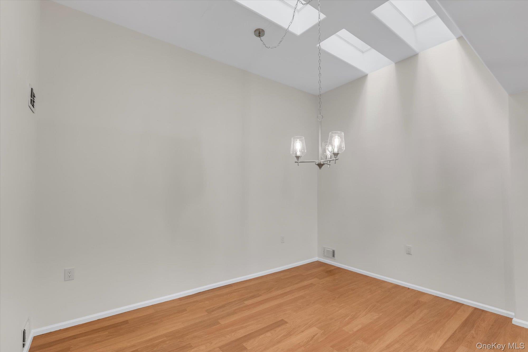 289 Glen Drive Ridge, NY 11961 - Photo 8 of 19 a view of a room with wooden floor