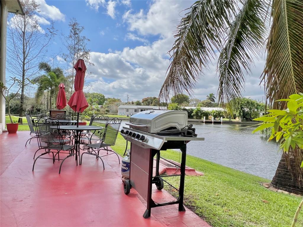 3002 Northeast 5th Terrace, Unit 209B Wilton Manors, FL 33334 - Photo 21 of 25 a view of outdoor space with seating area and entertaining space