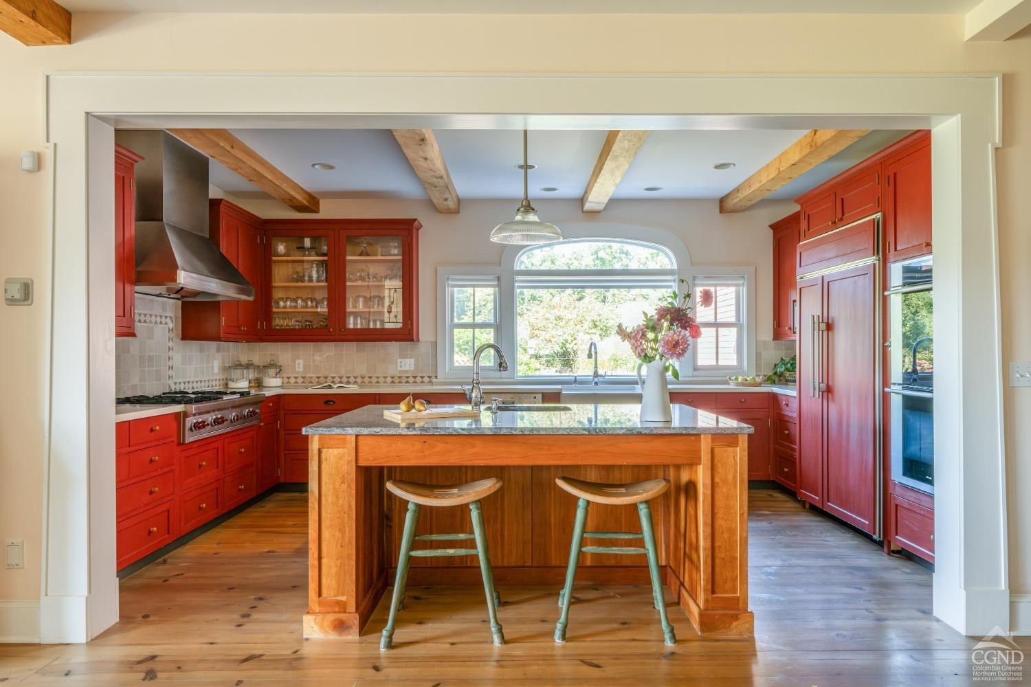 137 Catskill View Road Claverack, NY 12534 - Photo 13 of 55 a dining hall with stainless steel appliances kitchen island granite countertop wooden cabinets and dining table