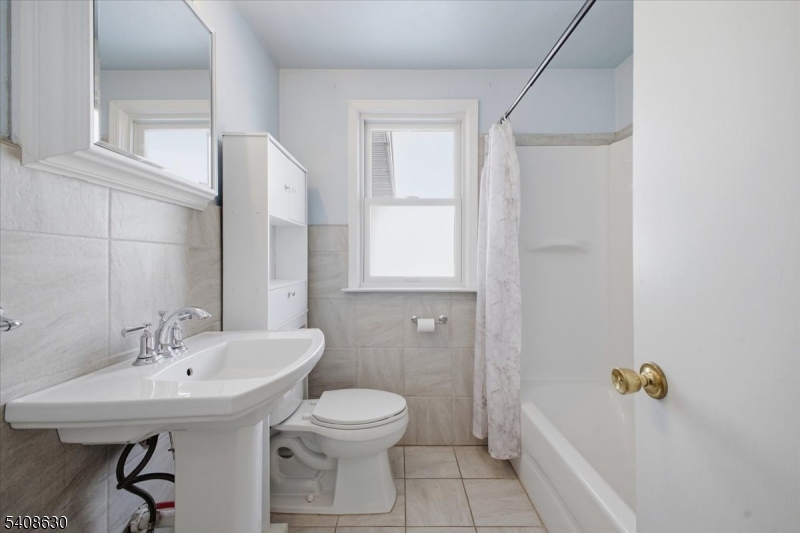 435 Spring Mills Road Milford, NJ 08848 - Photo 22 of 39 a bathroom with a sink a toilet and bathtub