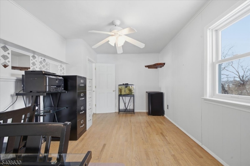 435 Spring Mills Road Milford, NJ 08848 - Photo 26 of 39 a living room with furniture and a flat screen tv