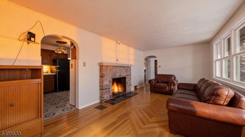 435 Spring Mills Road Milford, NJ 08848 - Photo 6 of 39 a living room with furniture and a fireplace