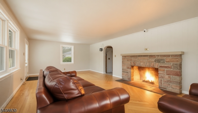 435 Spring Mills Road Milford, NJ 08848 - Photo 8 of 39 a living room with furniture and a fireplace