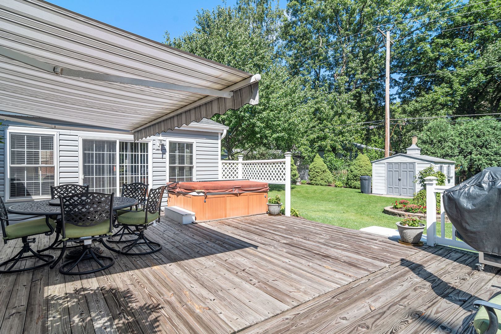 73 Foxcroft Road Naperville, IL 60565 - Photo 29 of 37 a view of a chair and tables in the backyard