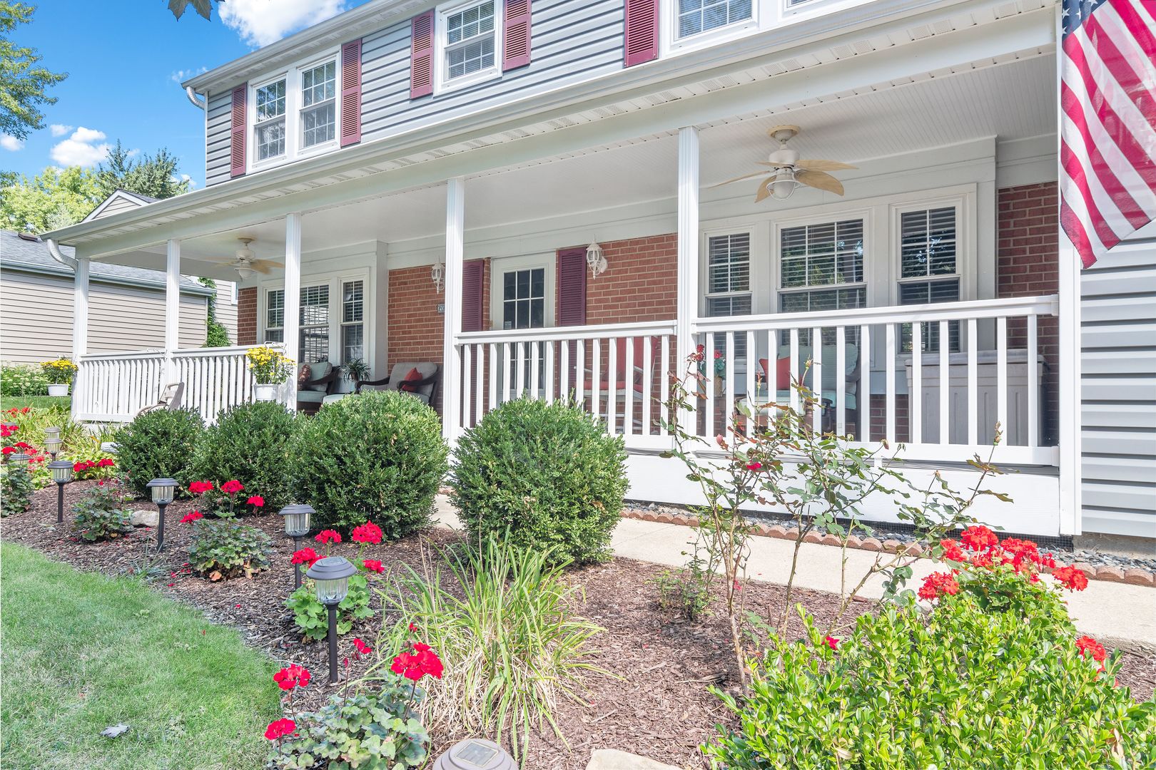 73 Foxcroft Road Naperville, IL 60565 - Photo 36 of 37 a flower garden in front of a house