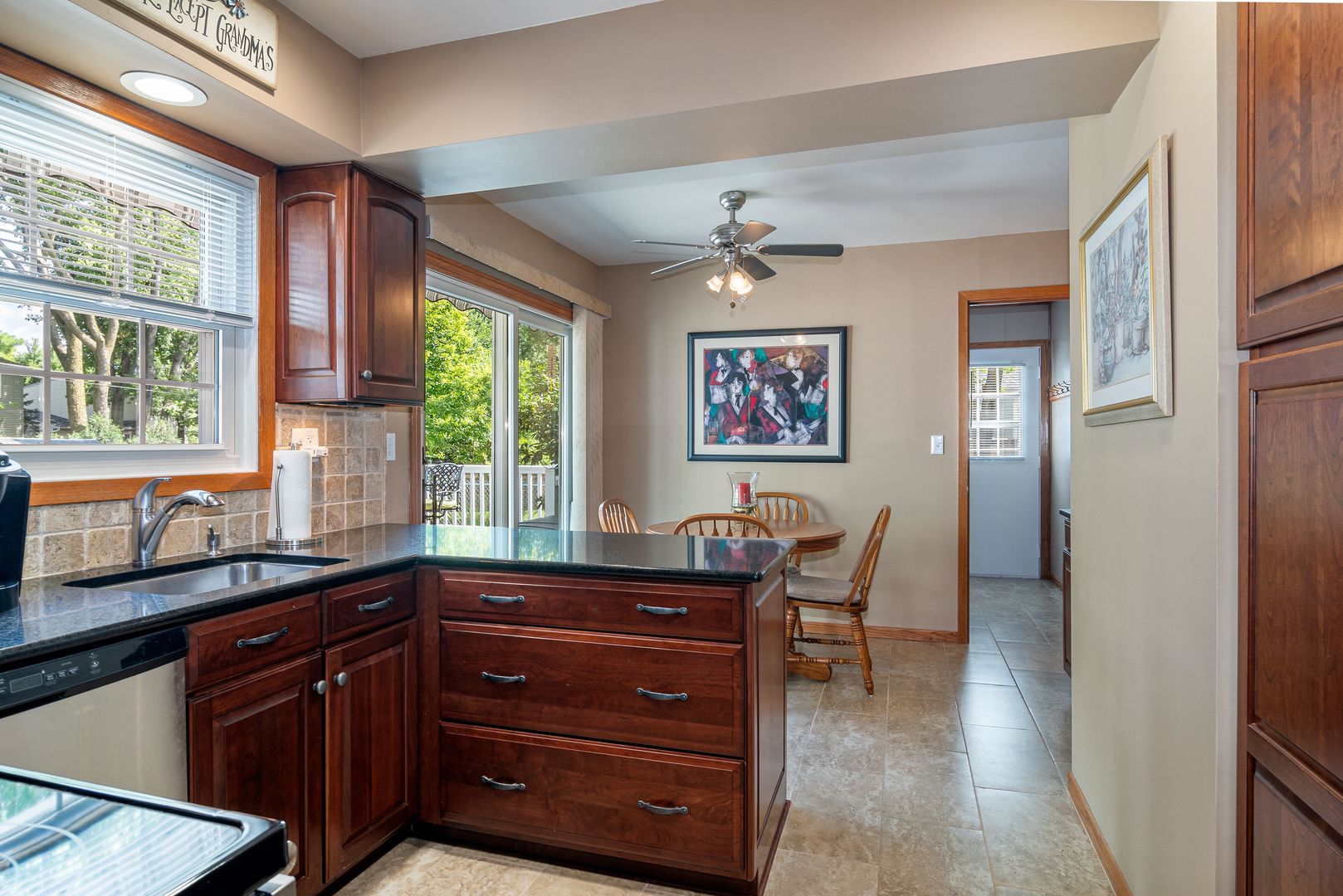 73 Foxcroft Road Naperville, IL 60565 - Photo 4 of 37 a kitchen with a cabinets and furniture