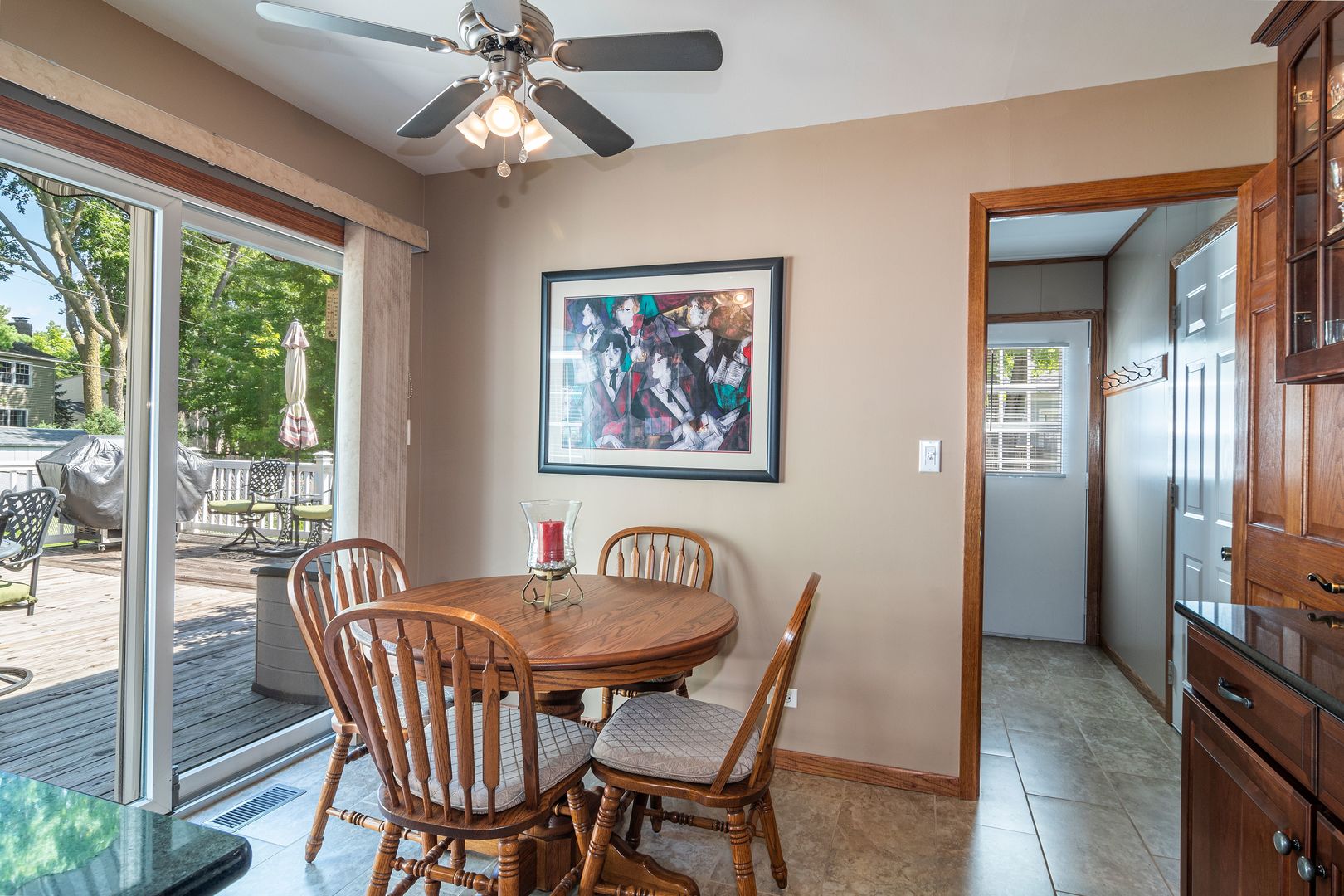 73 Foxcroft Road Naperville, IL 60565 - Photo 7 of 37 a dining room with furniture a chandelier and window
