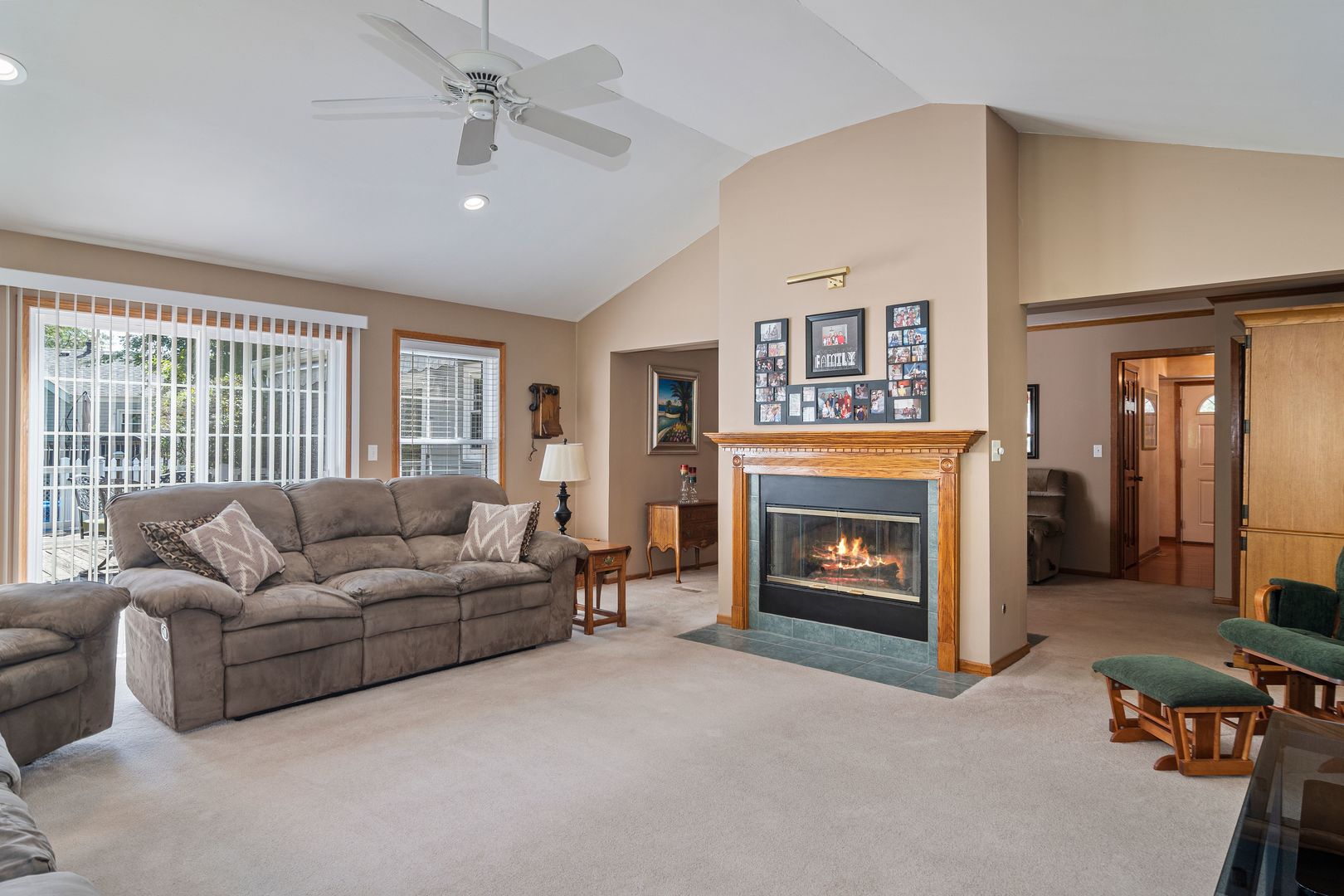 73 Foxcroft Road Naperville, IL 60565 - Photo 10 of 37 a living room with furniture and a fireplace