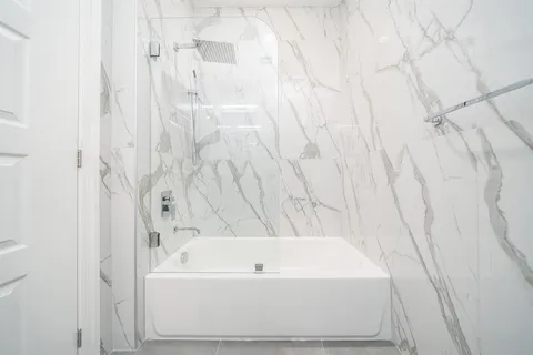 a bathroom with a bathtub
