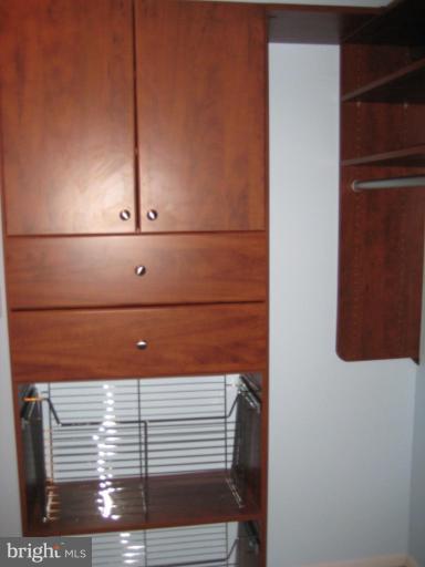 1999 Lakeport Way Reston, VA 20191 - Photo 15 of 21 Custom Closets in Master Bedroom