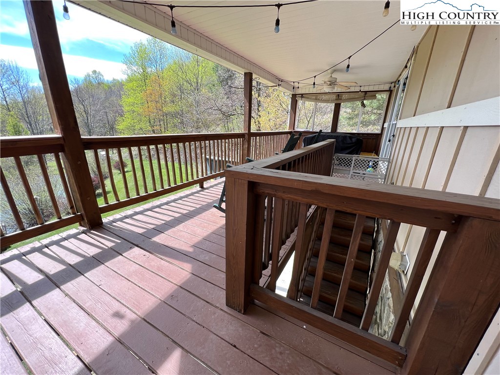 1534 Longhope Road Todd, NC 28684 - Photo 28 of 35 a view of deck with wooden floor and furniture