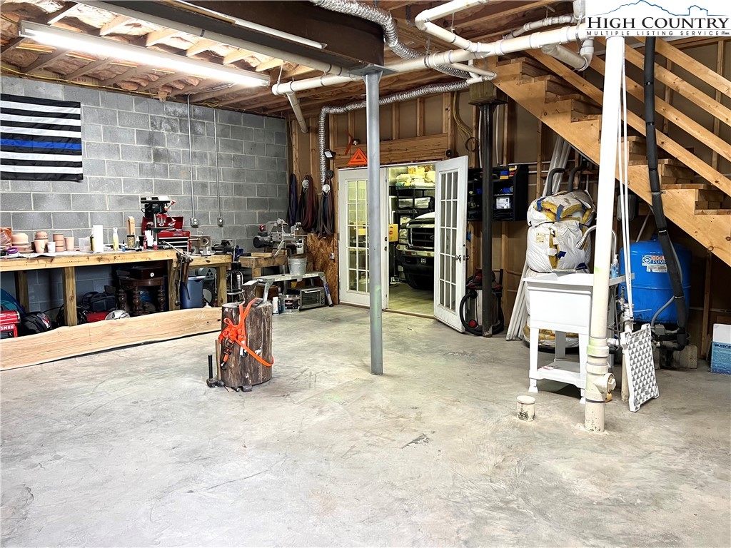 1534 Longhope Road Todd, NC 28684 - Photo 35 of 35 a view of a storage room with a lot of stuff