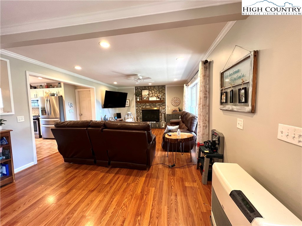 1534 Longhope Road Todd, NC 28684 - Photo 5 of 35 a living room with furniture and a flat screen tv
