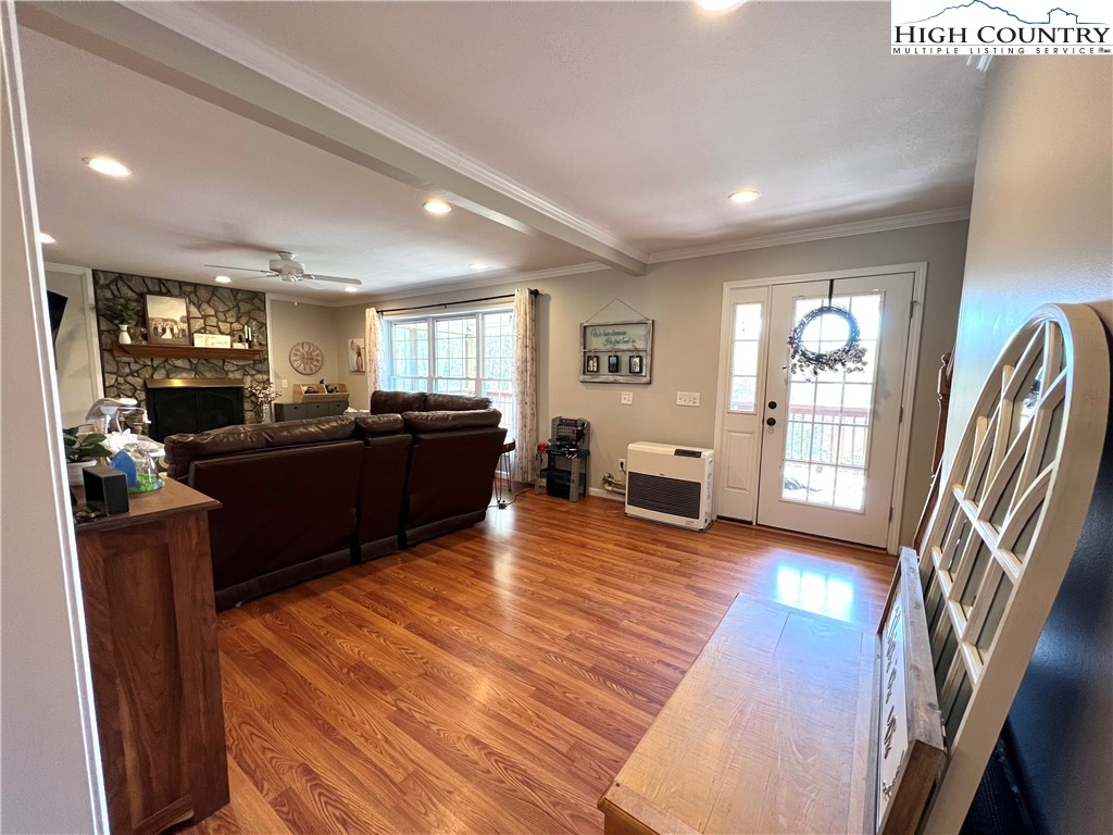 1534 Longhope Road Todd, NC 28684 - Photo 6 of 35 a living room with furniture and a wooden floor