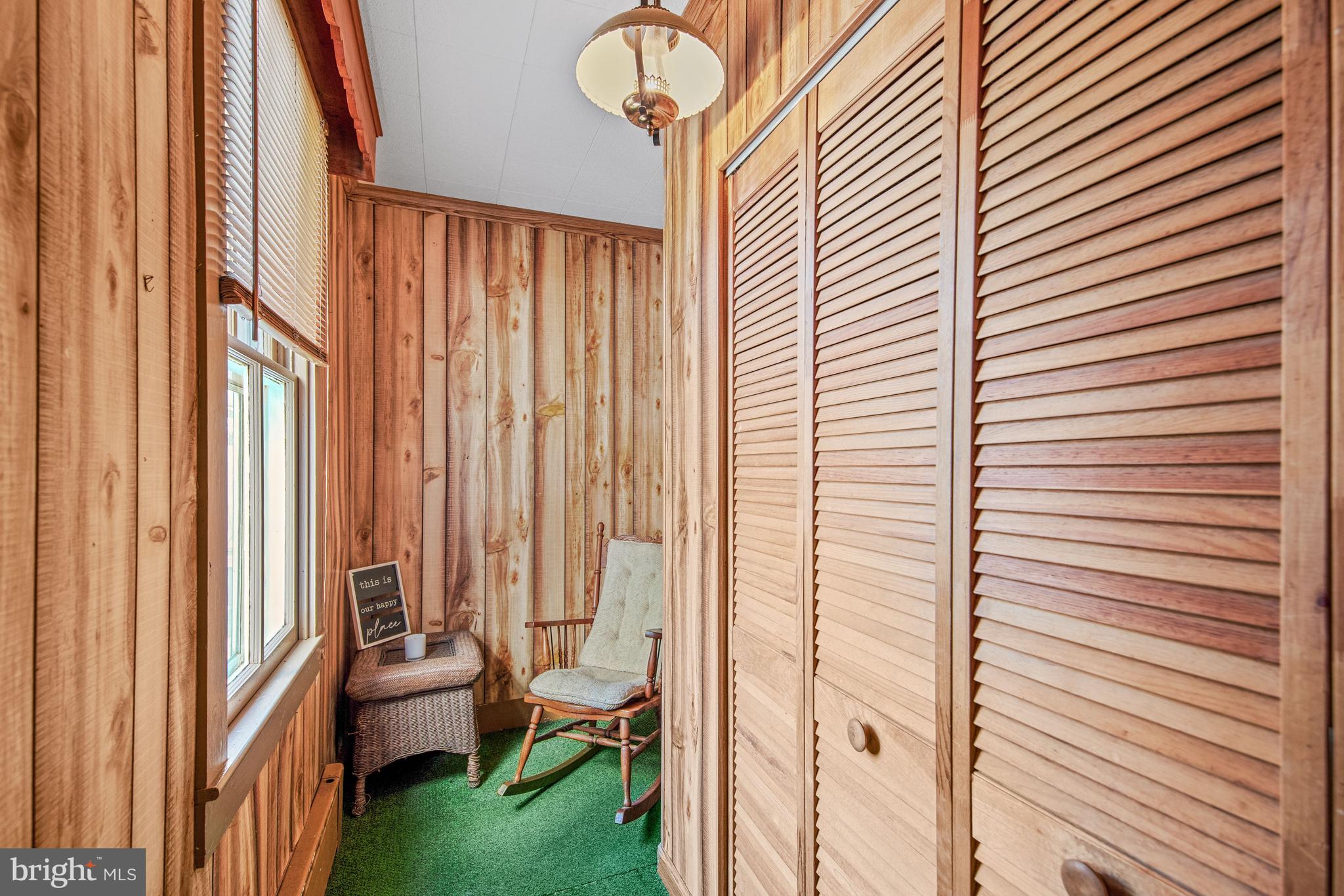 817 Locust Street Cambridge, MD 21613 - Photo 23 of 44 a bathroom with a sink and a mirror