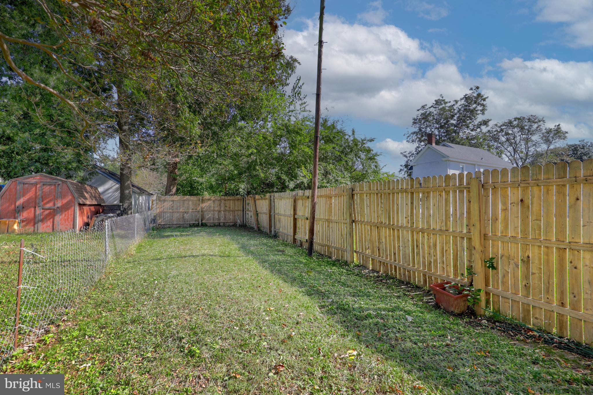 817 Locust Street Cambridge, MD 21613 - Photo 28 of 44 a view of backyard with green space